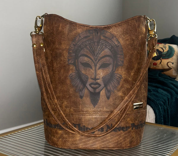 “A Beautiful Thing is Never Perfect” Bucket Bag