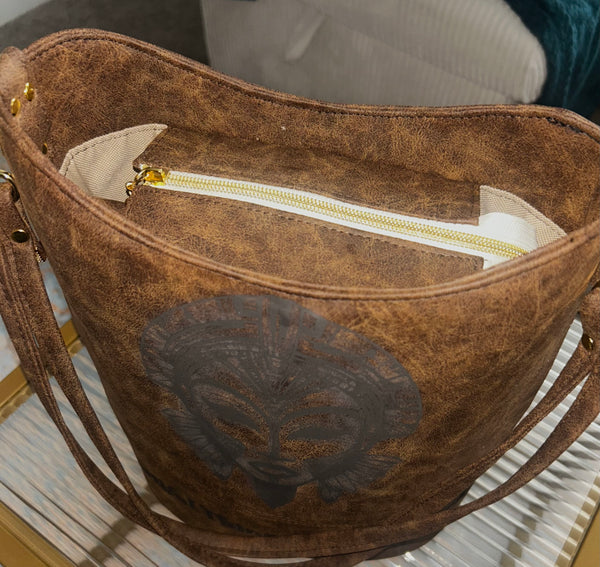 “A Beautiful Thing is Never Perfect” Bucket Bag