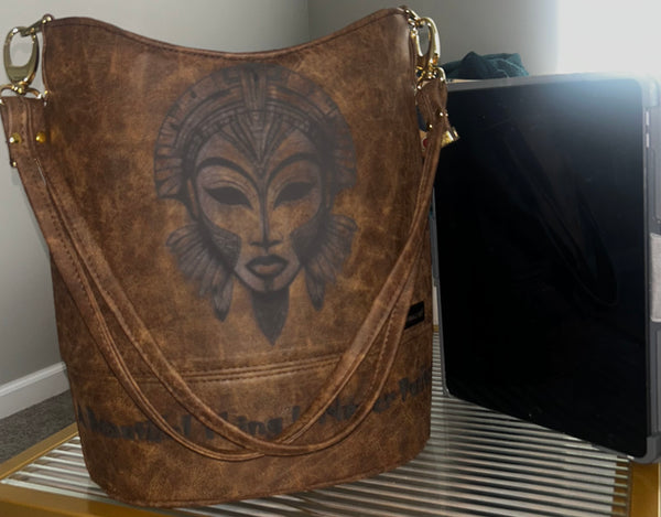 “A Beautiful Thing is Never Perfect” Bucket Bag